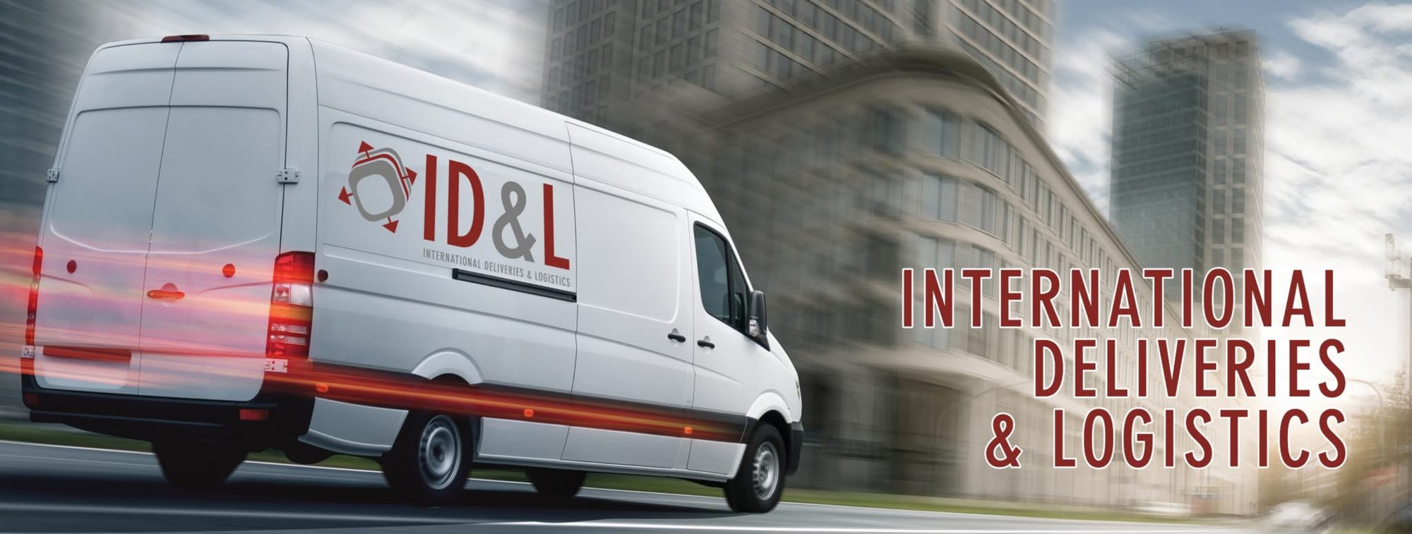 Furgone bianco con il logo ID&L e la scritta International Deliveries & Logistics